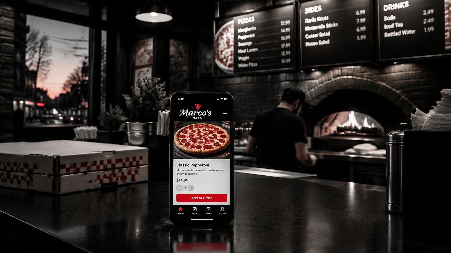 A smartphone on a pizza shop counter showing a branded online ordering screen with a red Add to Order button